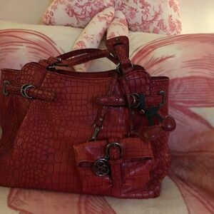 Jessica Simpson vegan leather red faux snake print satchel